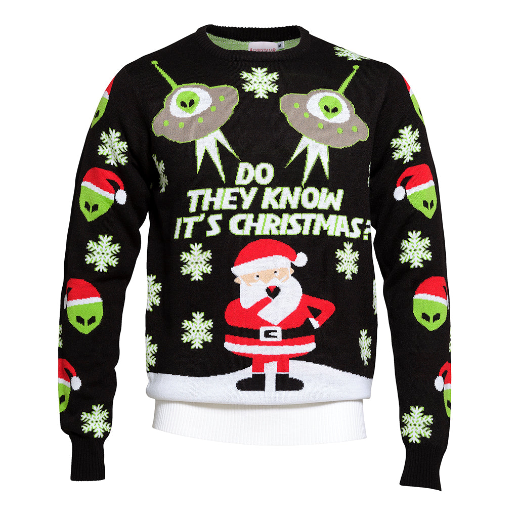 En julesweater med rumvæsner på og med citatet 